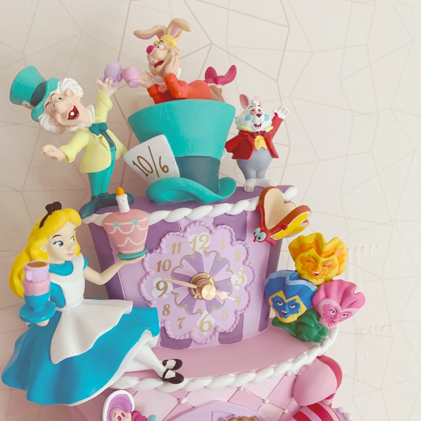 Alice clock wall