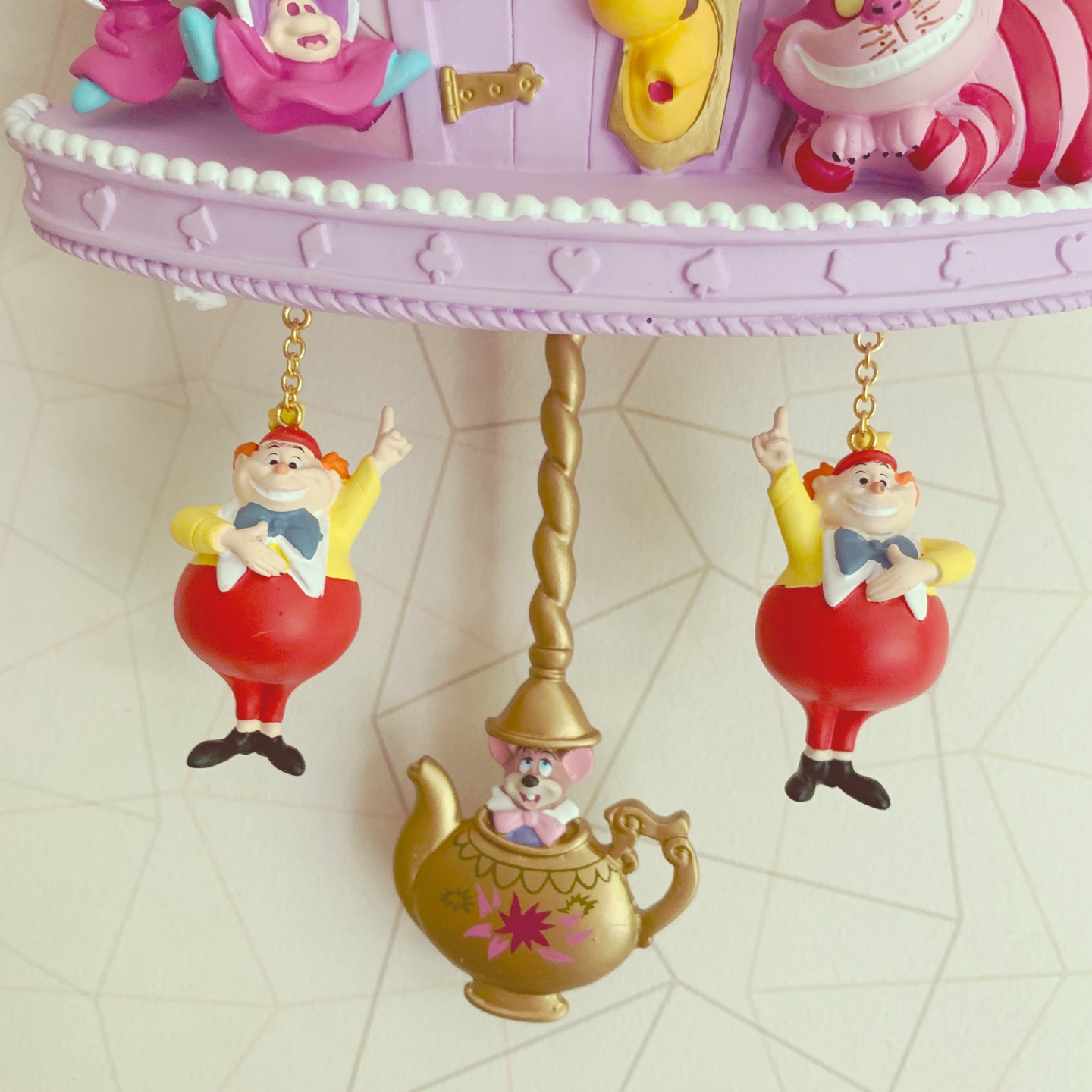 Alice clock wall